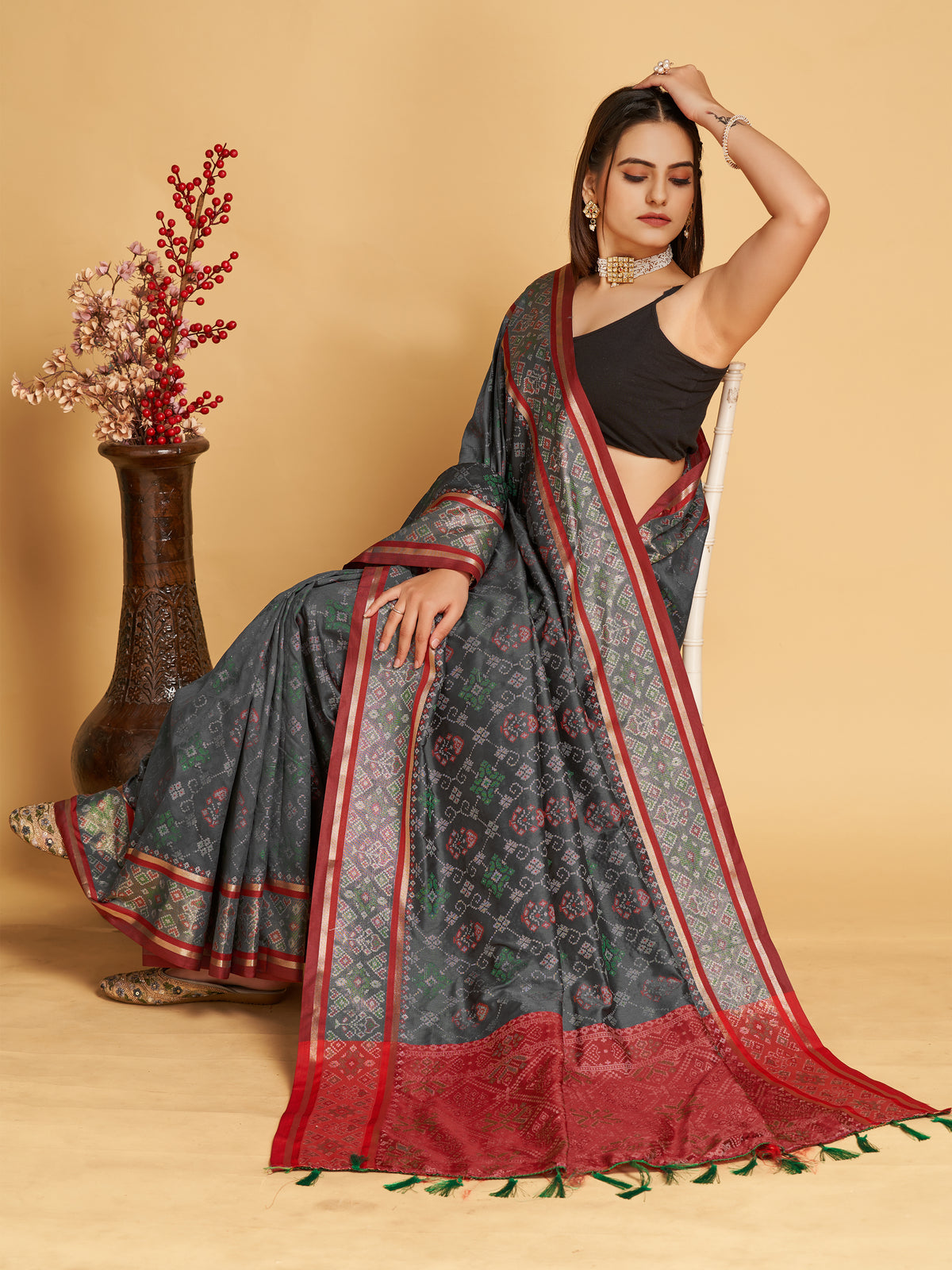 Elegant Black Printed Saree With Red Border Design