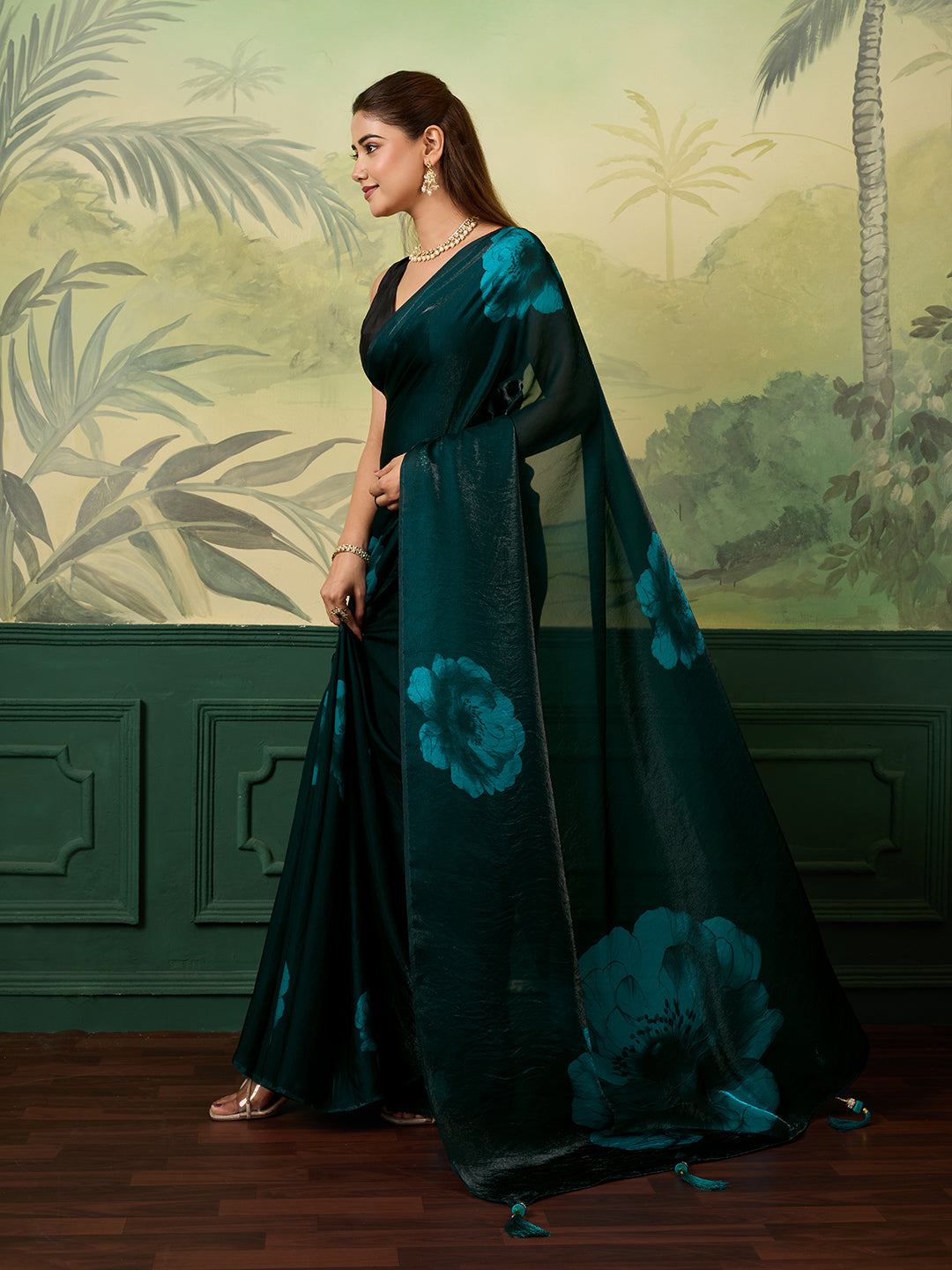 Elegant Teal Floral Printed Saree With Stylish Tassel Detailing
