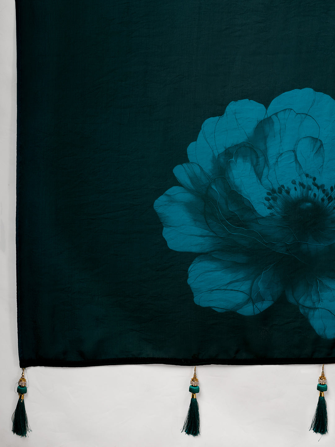 Elegant Teal Floral Printed Saree With Stylish Tassel Detailing