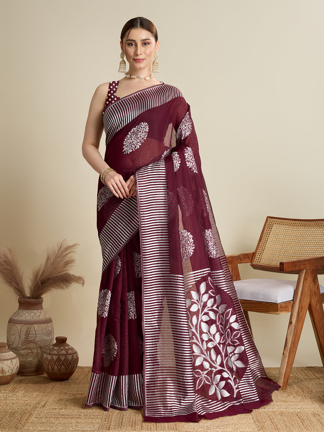 Elegant Maroon Saree With Floral Prints And Striped Border