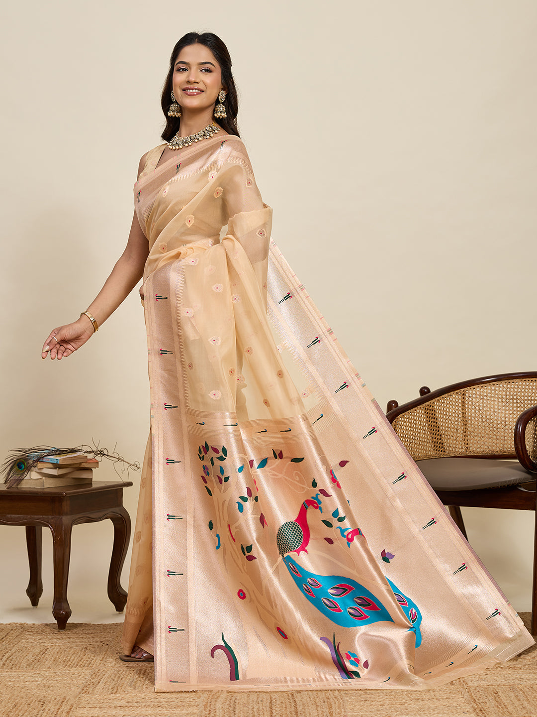 Elegant Peach Designer Saree With Peacock Print And Border
