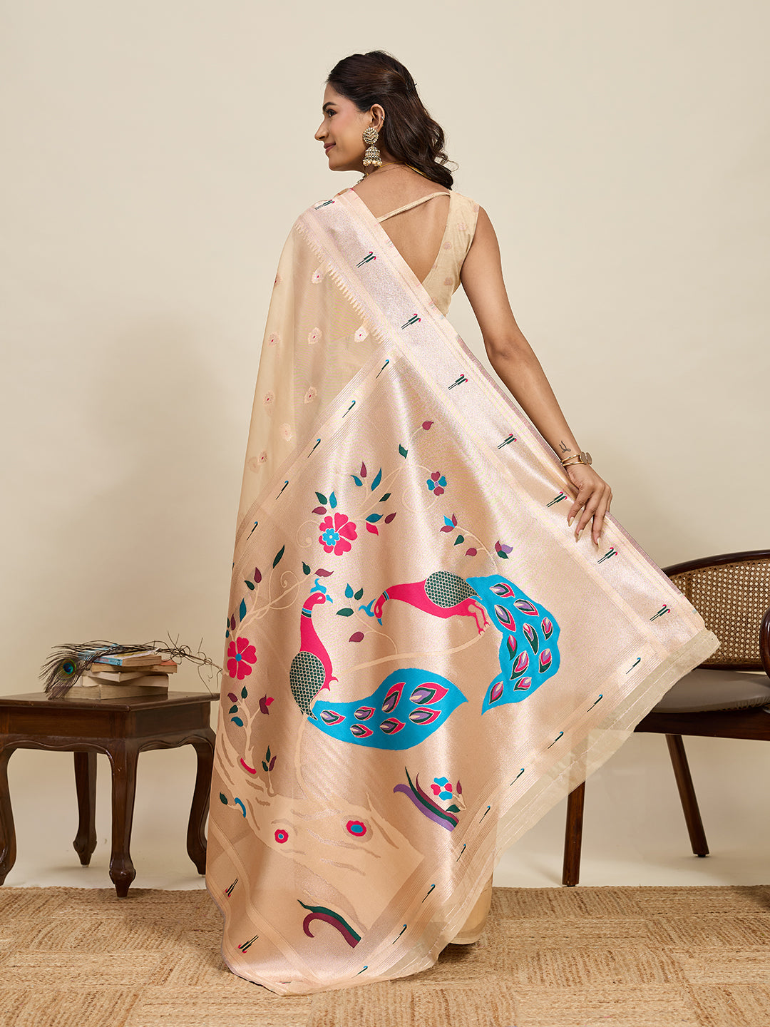 Elegant Peach Designer Saree With Peacock Print And Border