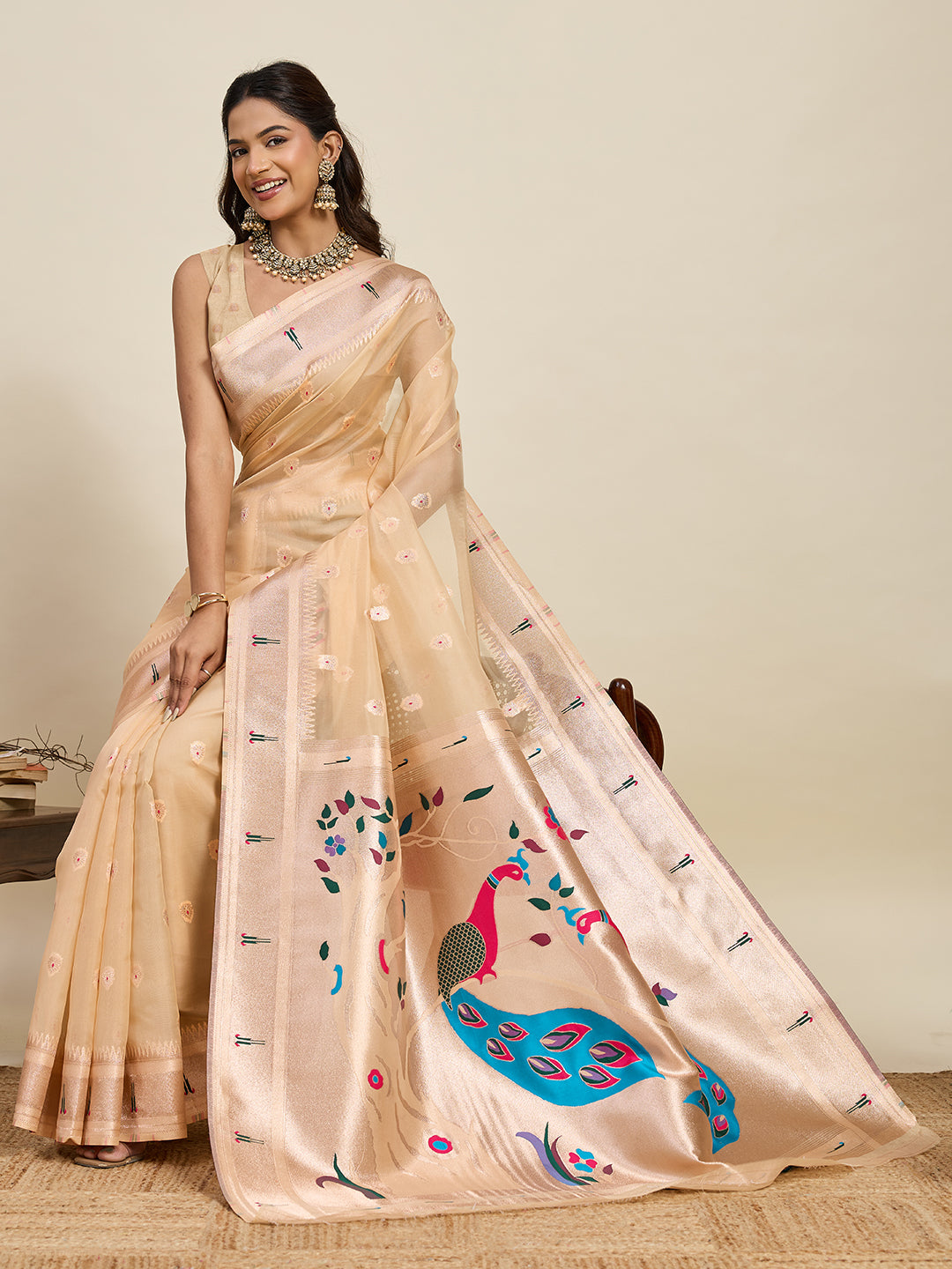 Elegant Peach Designer Saree With Peacock Print And Border