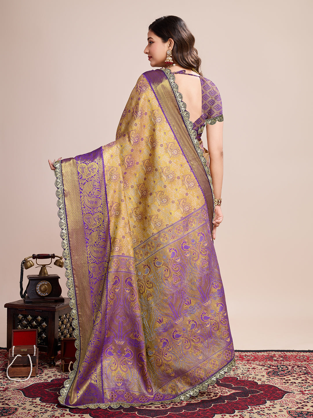 Elegant Purple Gold Designer Saree With Intricate Traditional Motifs