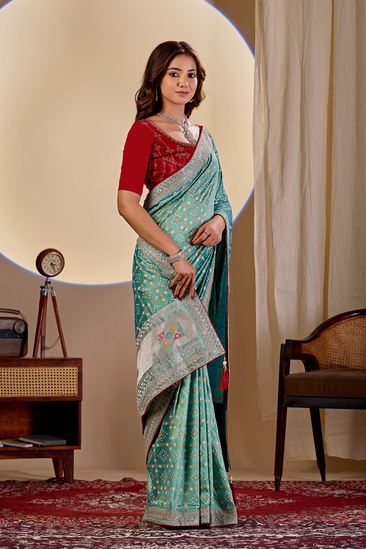 Elegant Teal Green Saree With Silver Embroidered Border