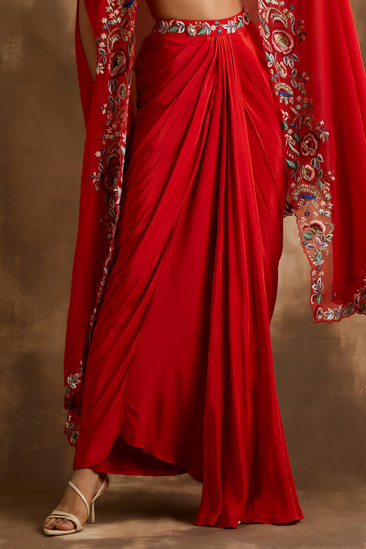 Red draped skirt with embroidered crop top & cape