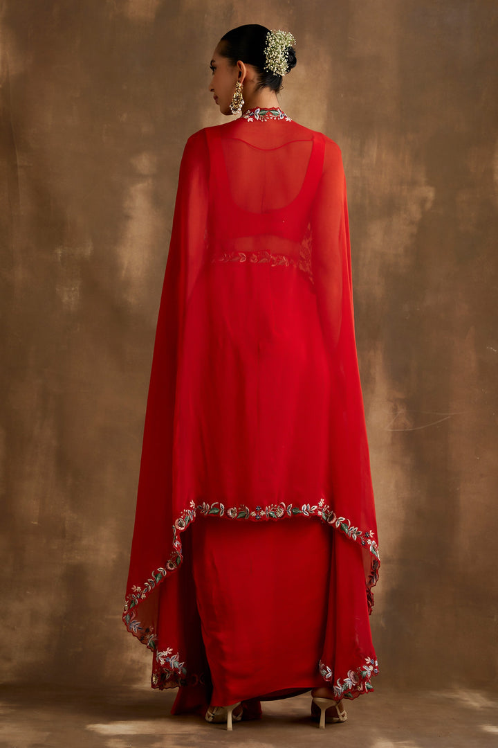 Red draped skirt with embroidered crop top & cape