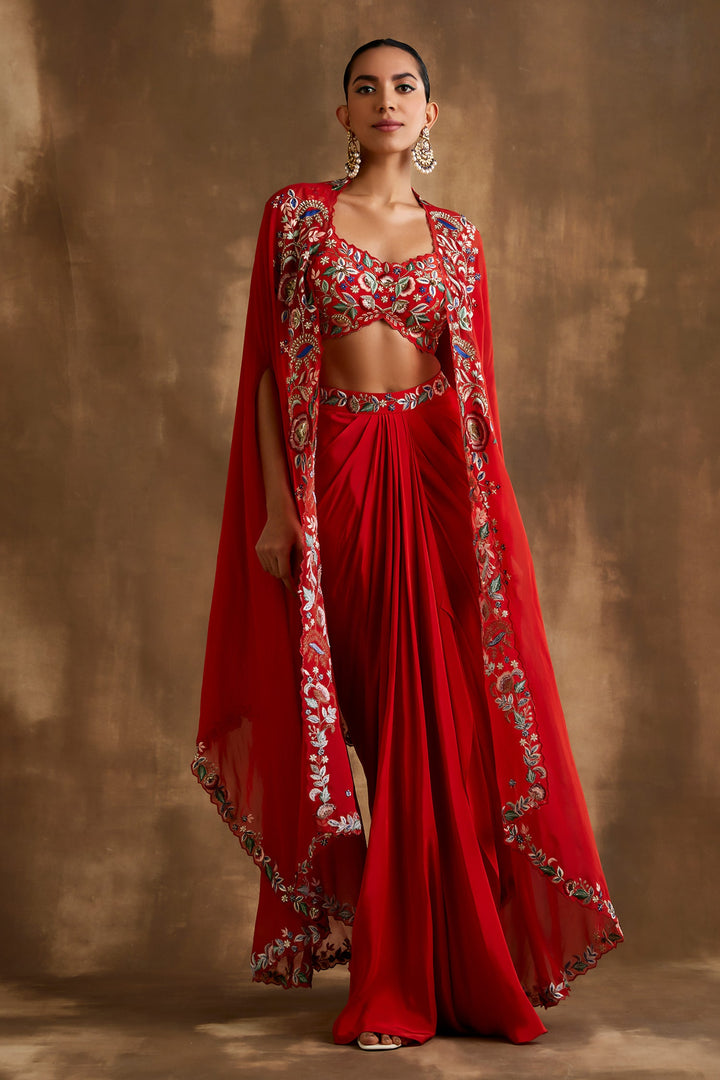 Red draped skirt with embroidered crop top & cape