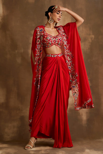 Red draped skirt with embroidered crop top & cape